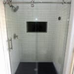 glass shower door with roller hardware