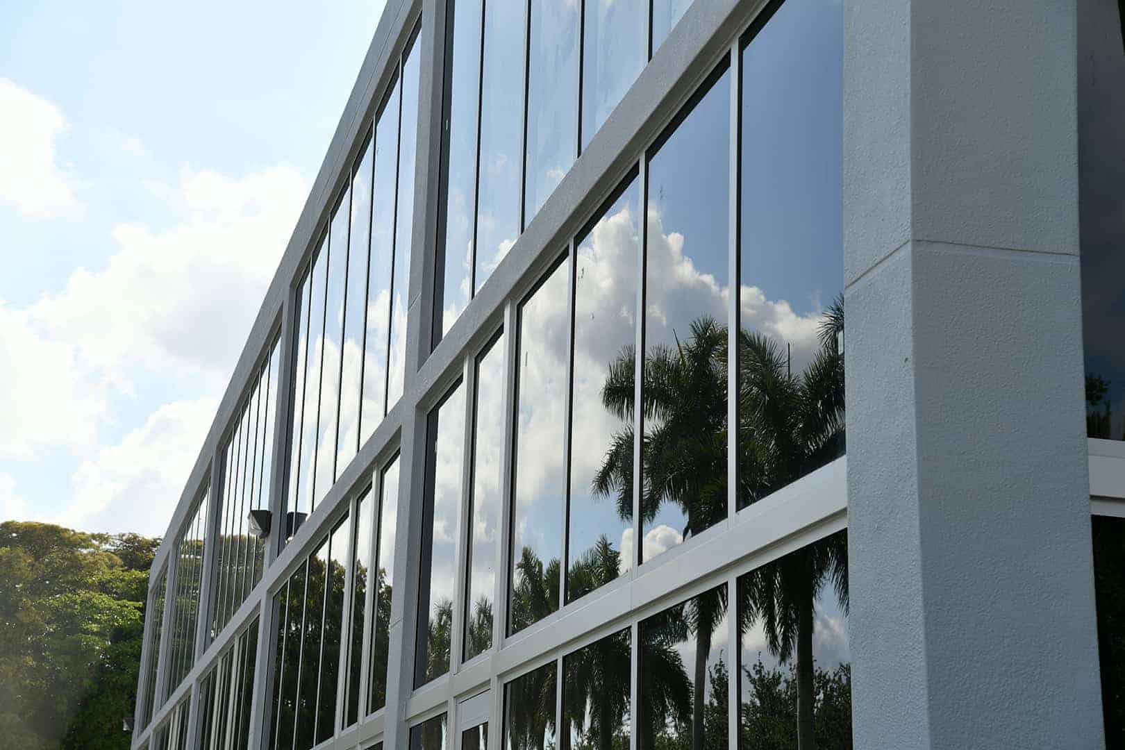 Side view of commercial building with front glazed system from Aldora.