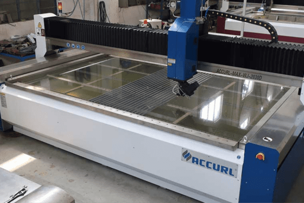 glass water jet cutter in manufacturing facility