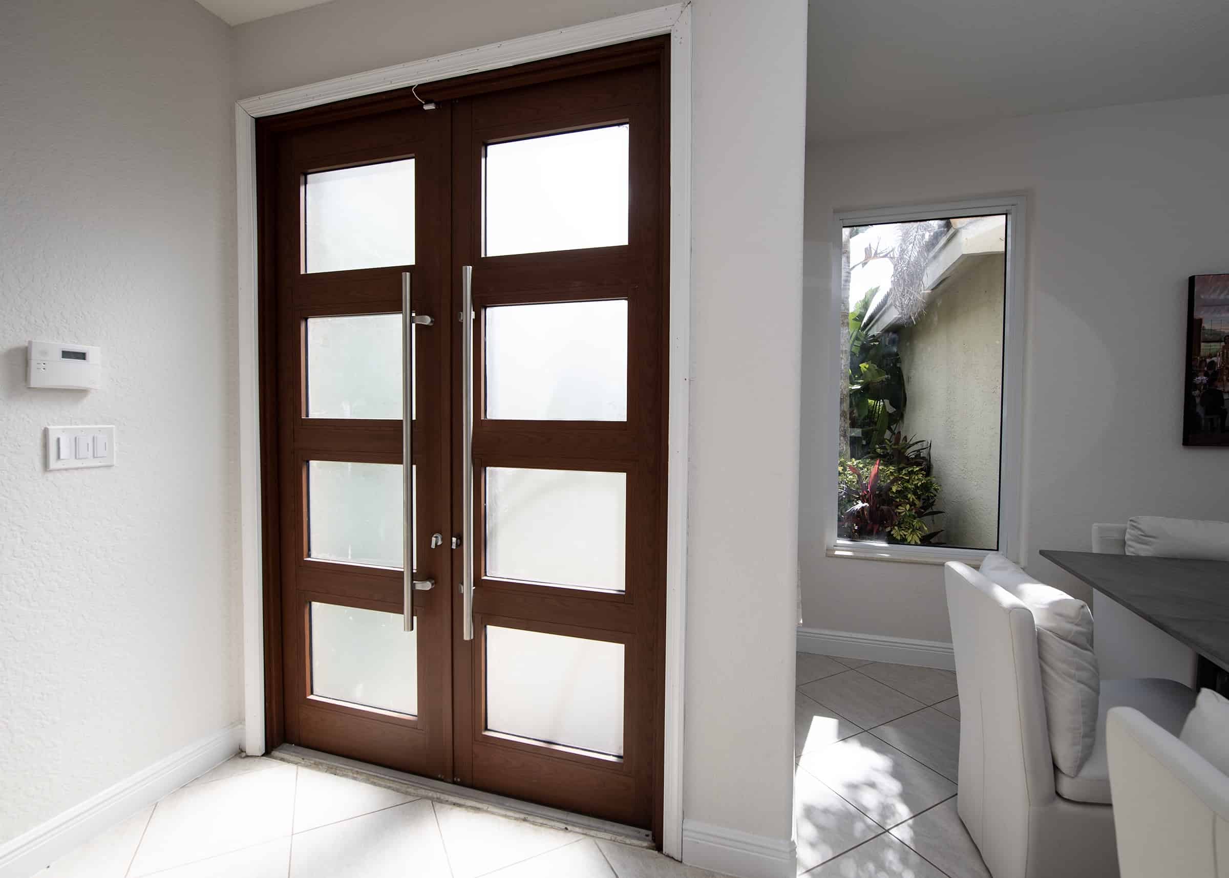 entrance door with ladder pull hardware