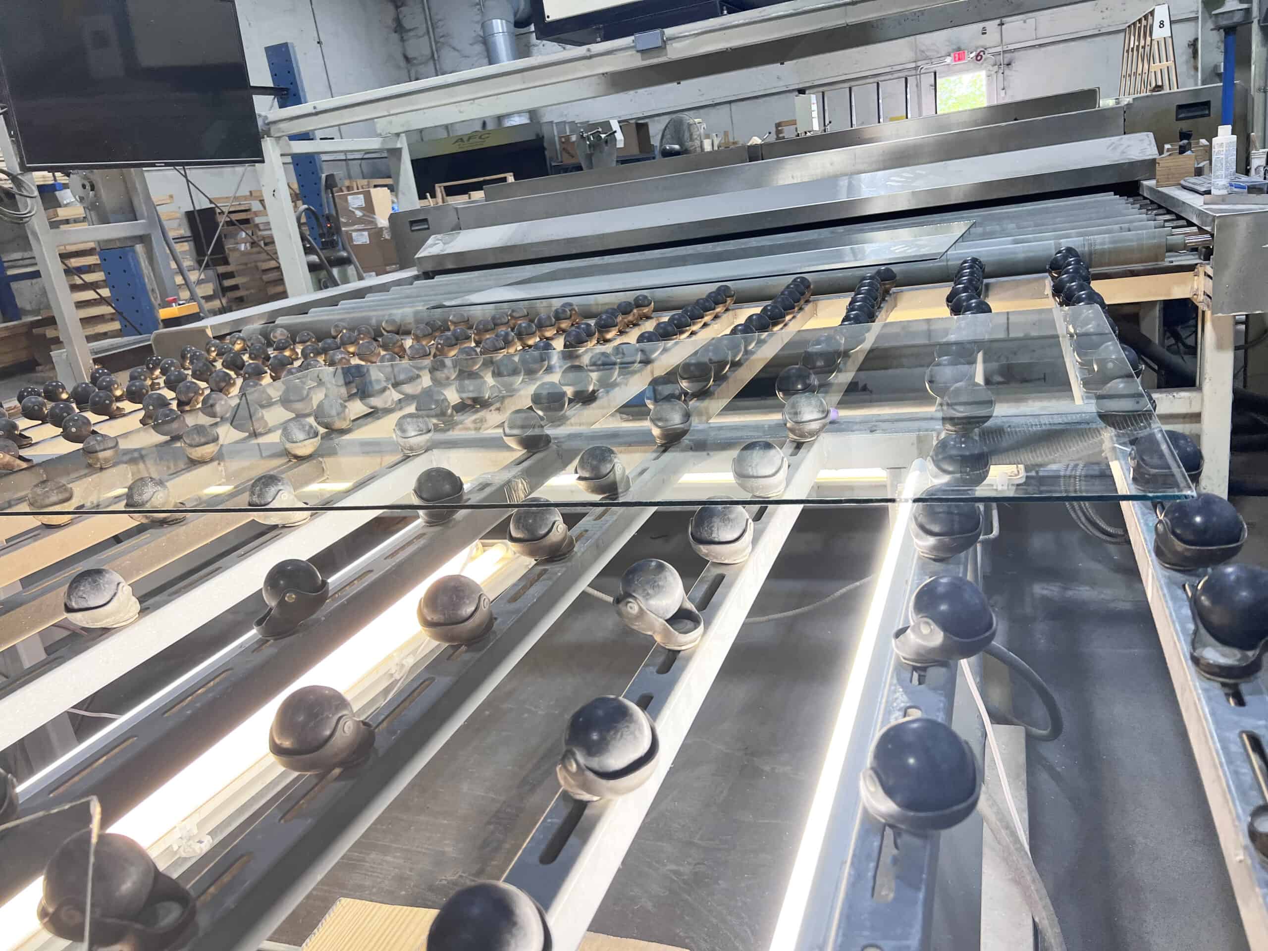 Glass fabrication machinery