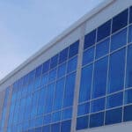 exterior of new hights building with frontset plus window wall