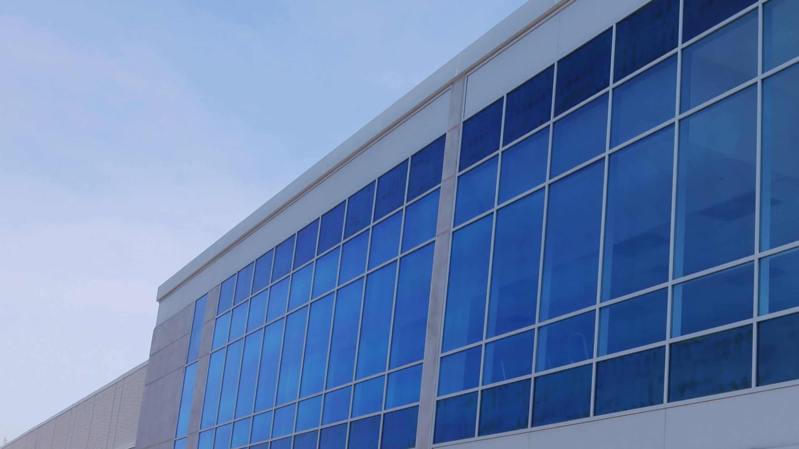 exterior of new hights building with frontset plus window wall