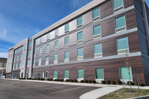 four-storey commercial building with individual windows